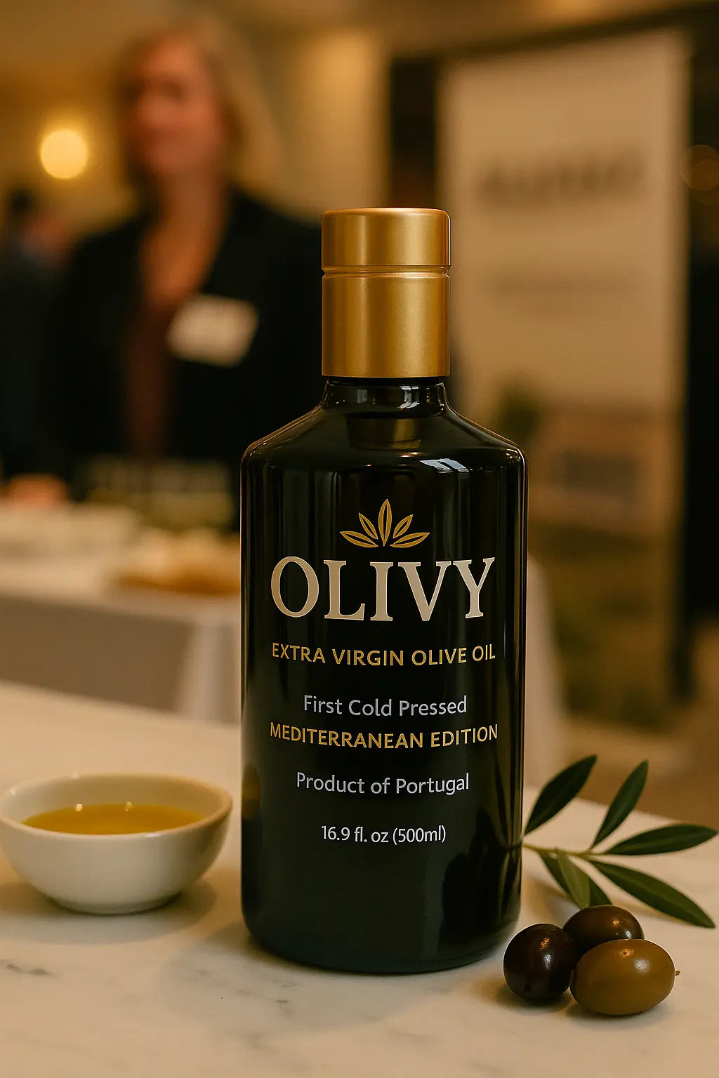 Bottle of Olivy Extra Virgin Olive Oil on a table with a blurred background