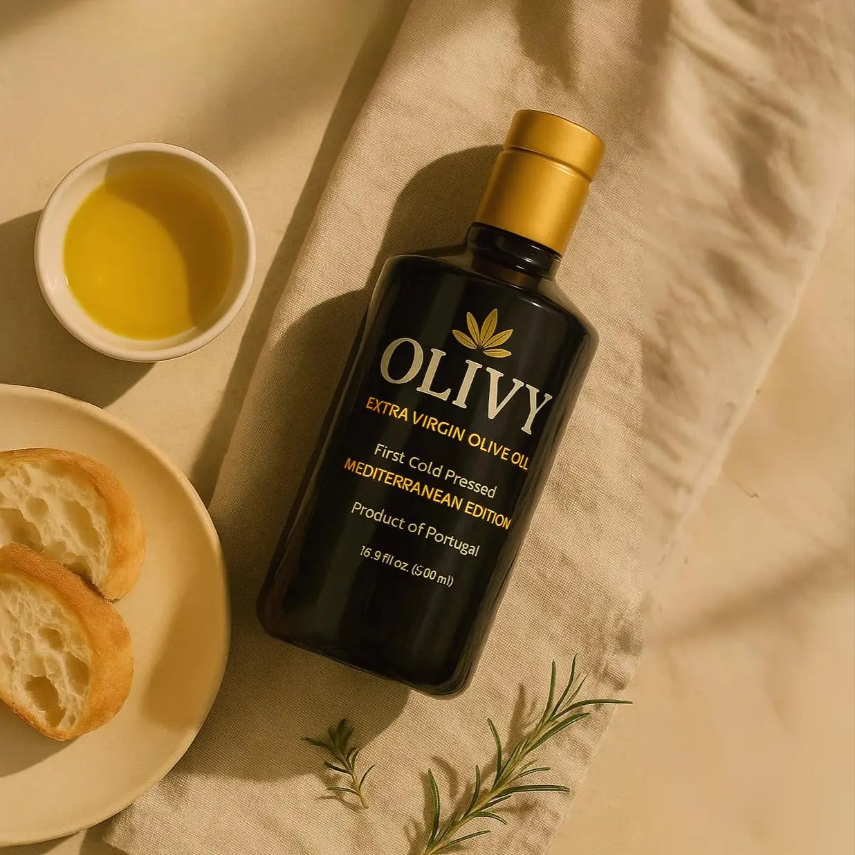 OLIVY extra virgin olive oil bottle with a small bowl of olive oil and bread slices on a textured surface